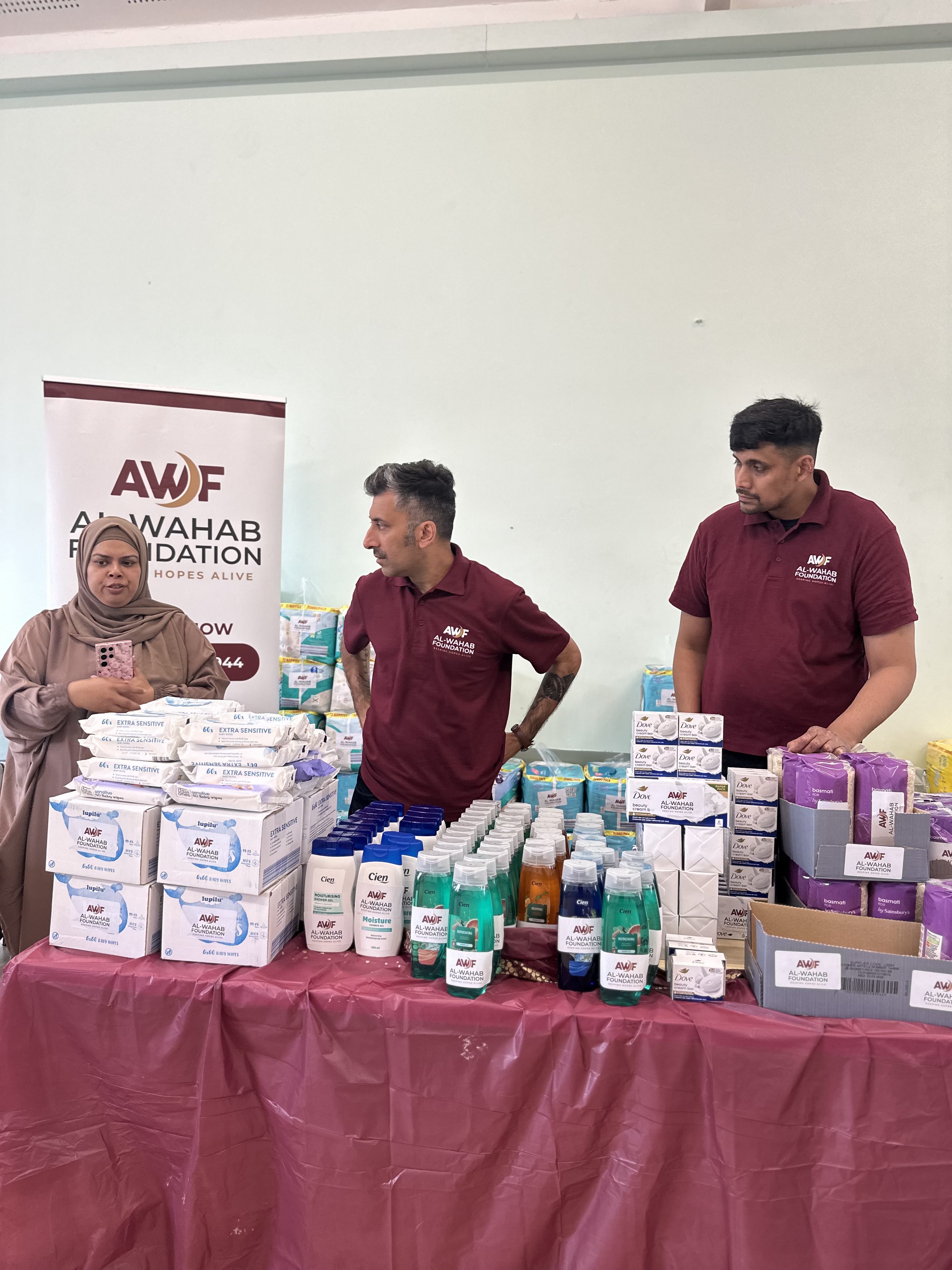 Al-Wahab Foundation team collaborating for community impact