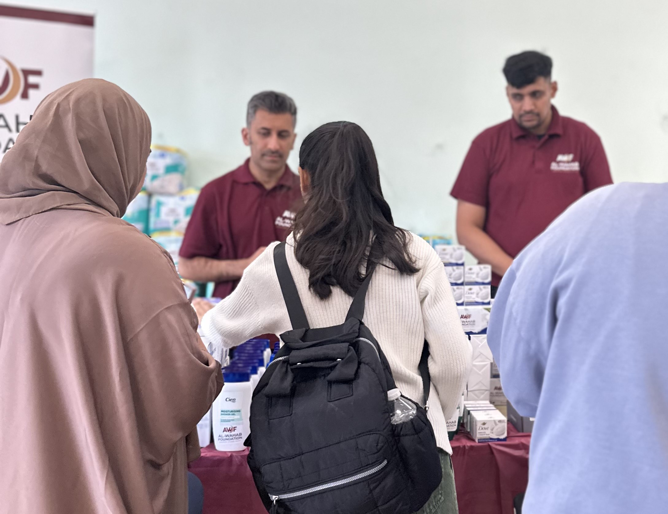 Al-Wahab Foundation volunteers distributing essential supplies to families in Harrow