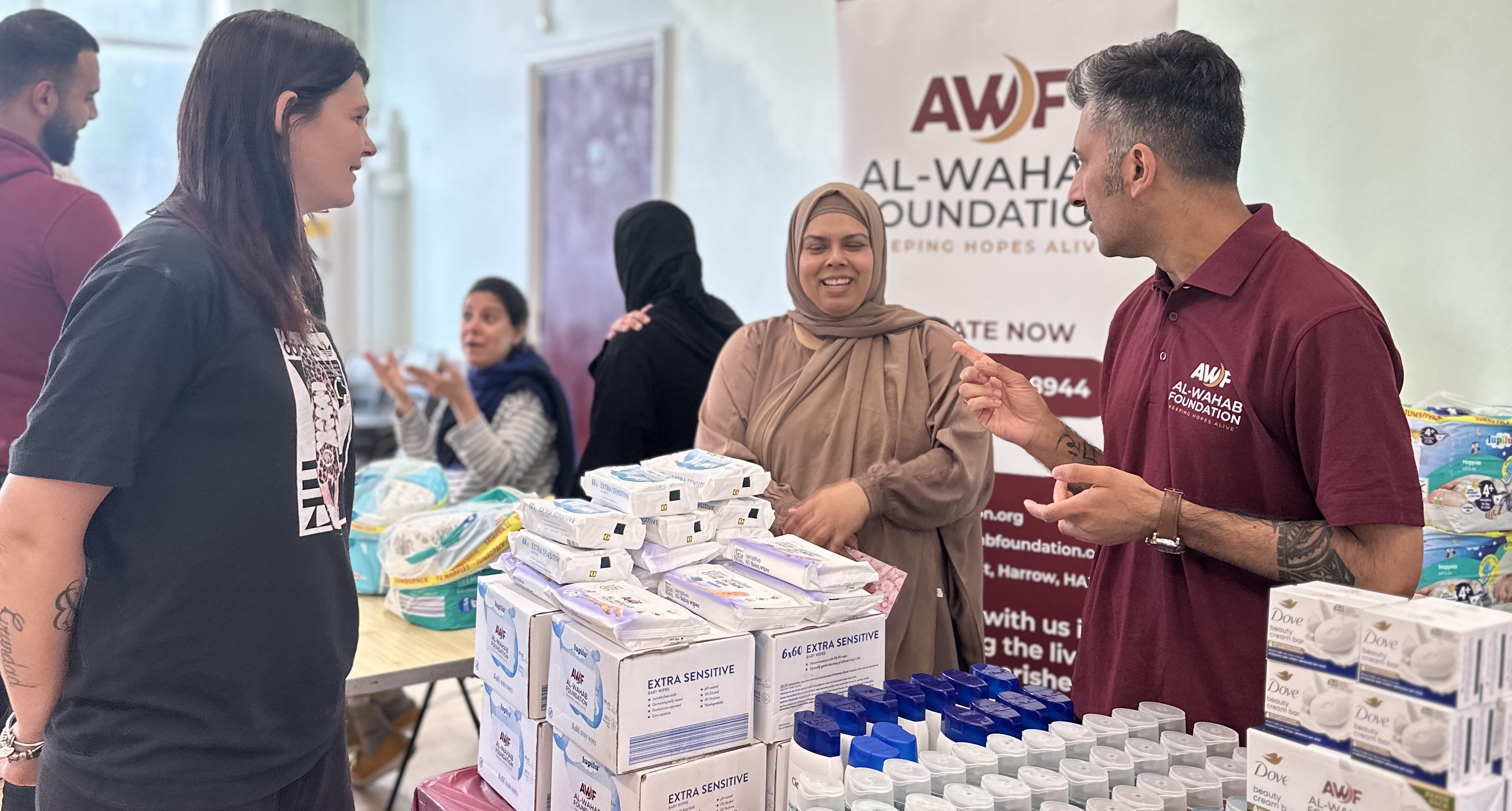 AWF organizing food and baby care packages for families