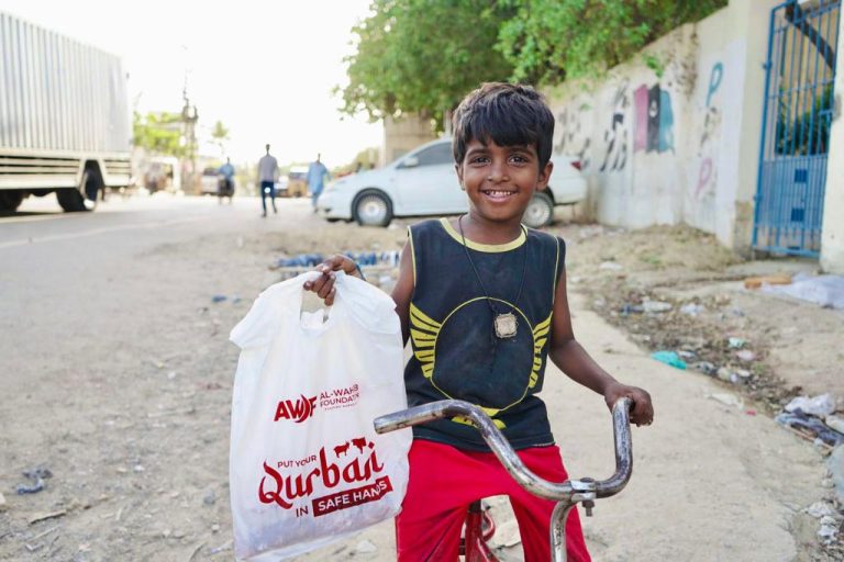 Qurbani Distribution to a child