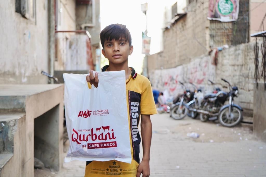 Child with Qurbani Meat