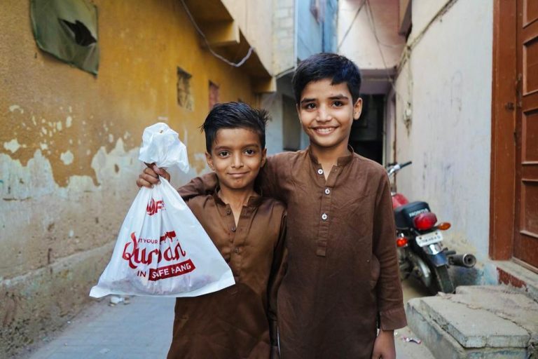 Happy Children with Qurbani Meat